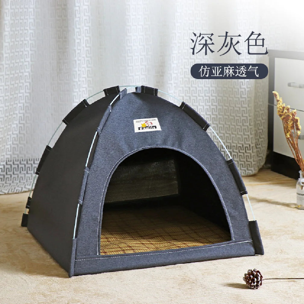 Cat resting inside grey pop-up tent bed